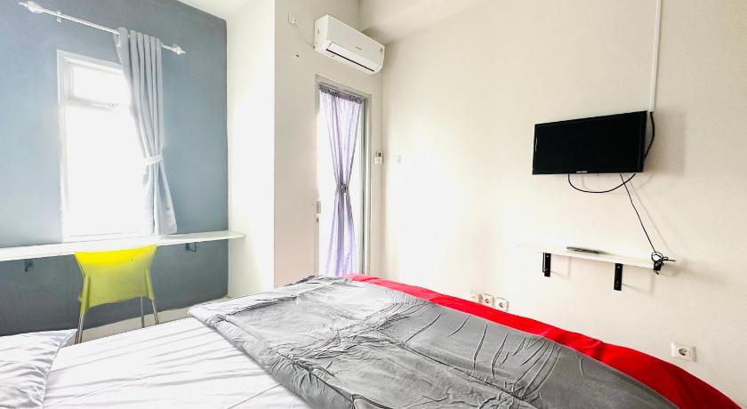 RedLiving Apartment @ Dramaga Tower by Liana Room - image 9