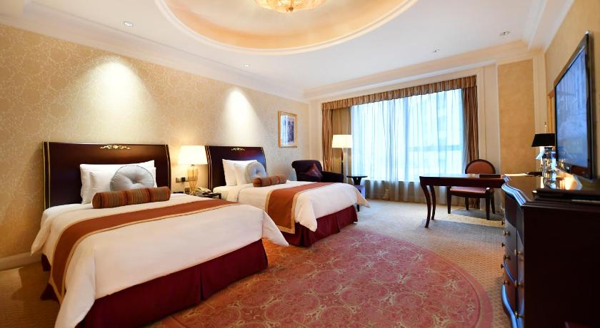 Фото: Двухместный номер Делюкс с 2 отдельными кроватями (Deluxe Twin Bed) 1