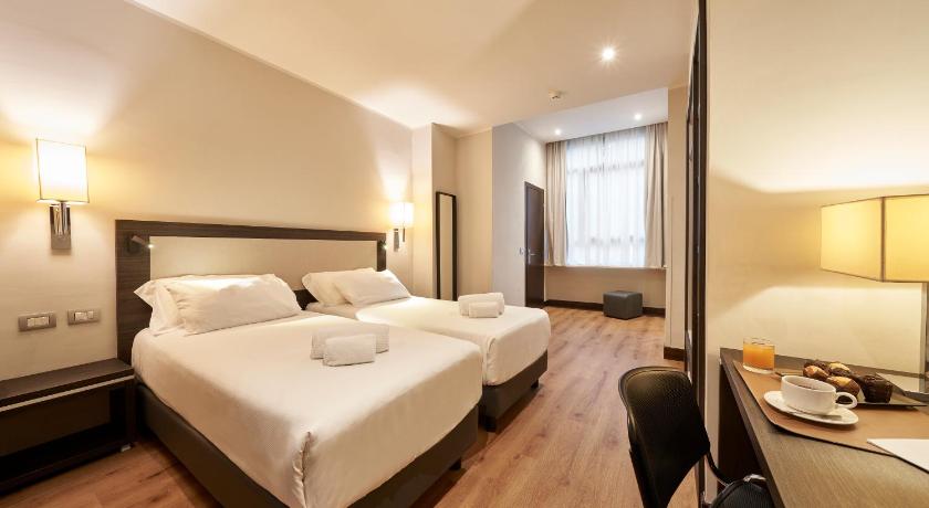 Deluxe szoba kétszemélyes ággyal vagy 2 külön ággyal (Deluxe Double or Twin Room) fotója 0