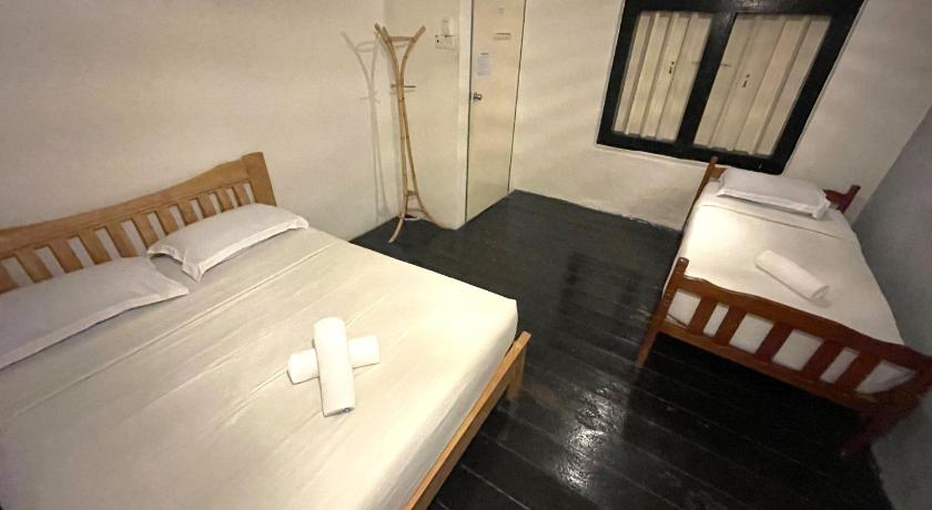 รูปของดีลักซ์ สำหรับ 3 คน (Deluxe Triple Room) 0