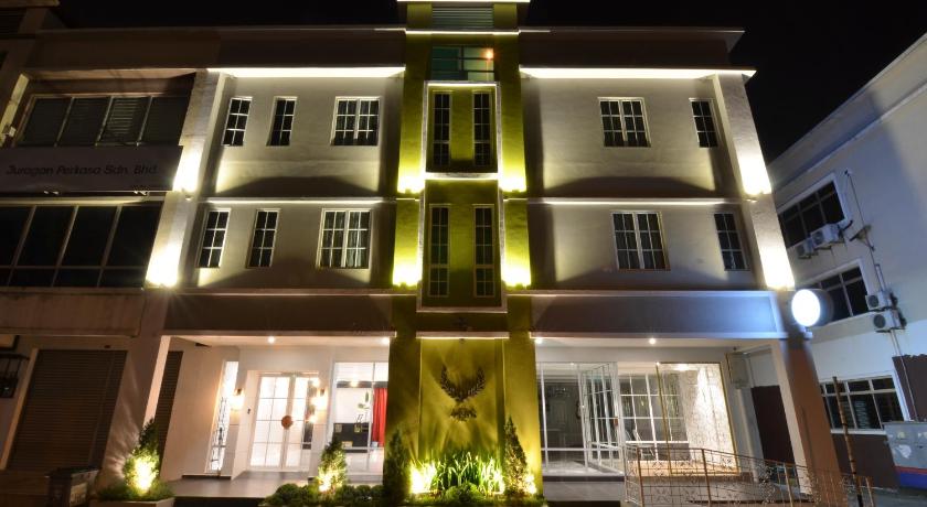 a tall building with a clock on the front of it, The Ardens Hotel - Austin in Johor Bahru
