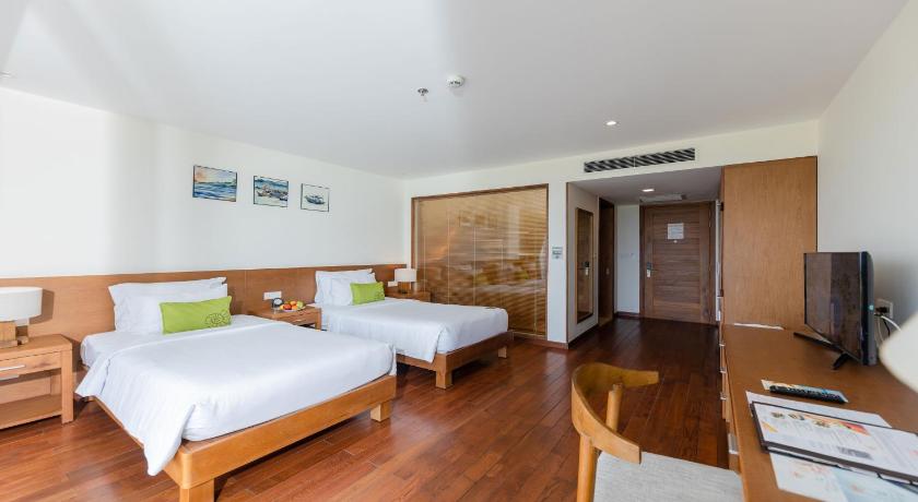 Foto Deluxe Twin dengan Pemandangan Laut (Deluxe Twin Ocean View) 7
