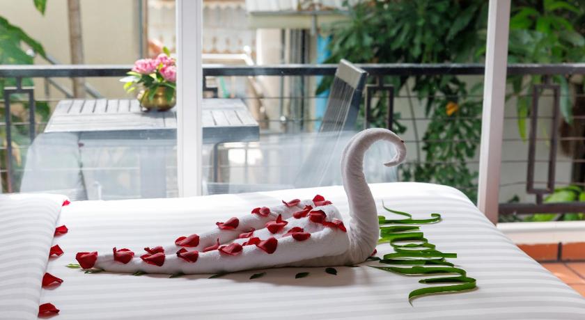 Image of Deluxe Double Room with Balcony and Pool view 13