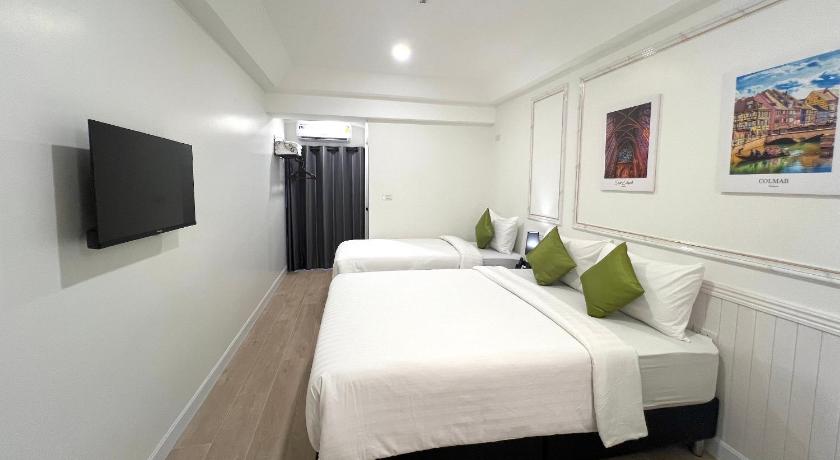 รูปของดีลักซ์ สำหรับ 3 คน (Deluxe Triple Room) 0