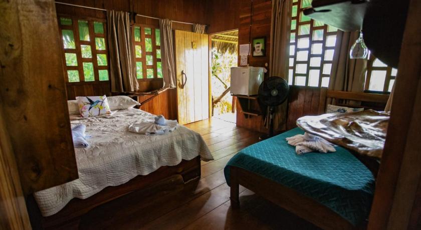 Image of Triple Wooden Cabin with Partial Sea View 16