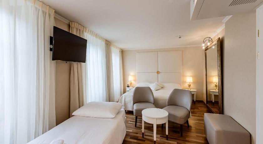 Image of Triple Room with City View 1