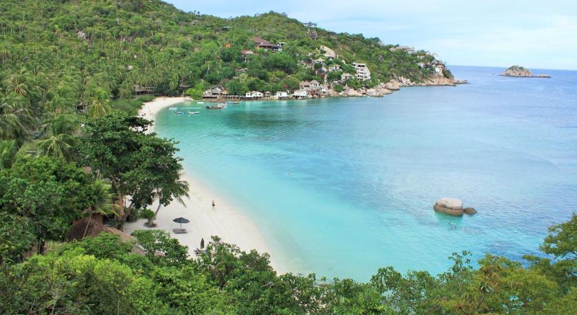 a large body of water surrounded by trees, Haadtien Beach Resort (SHA Extra Plus) in Ko Tao