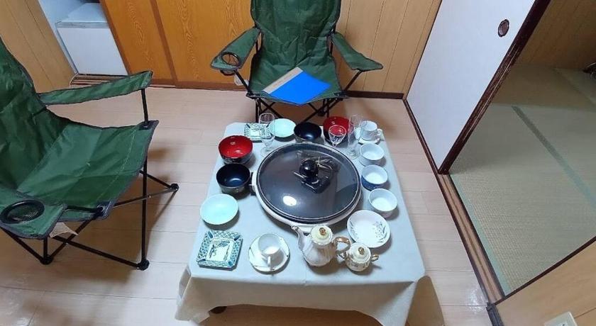 大阪 Pet-friendly and close to USJ and Expo site. Log cabin-style room with wood accents. 2星级 民宿 大堂