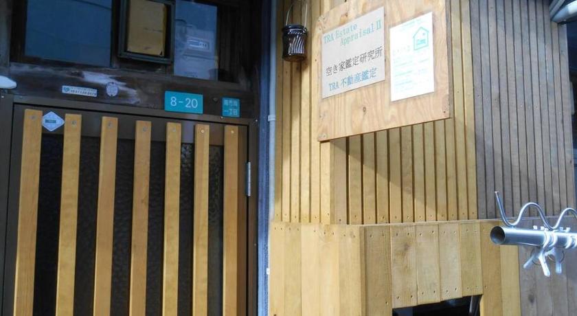 大阪 Pet-friendly and close to USJ and Expo site. Log cabin-style room with wood accents. 2星级 民宿 套房