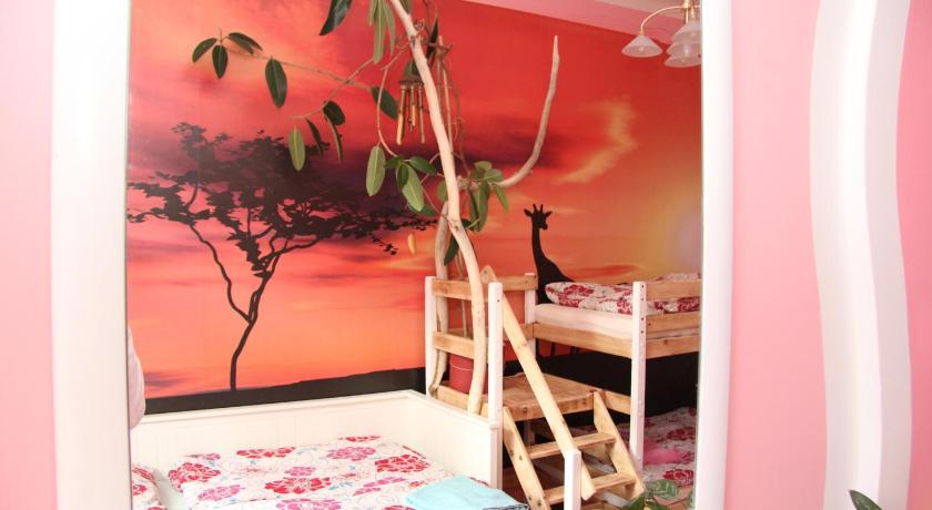 Image of Economy Quadruple Room with Shared Bathroom 10