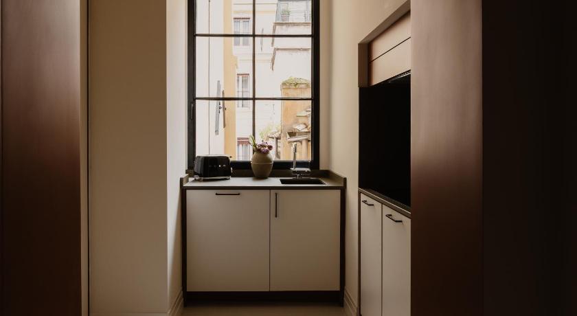 Image of Two-Bedroom Suite - Separate Building (Piazza di Spagna, 31) 1
