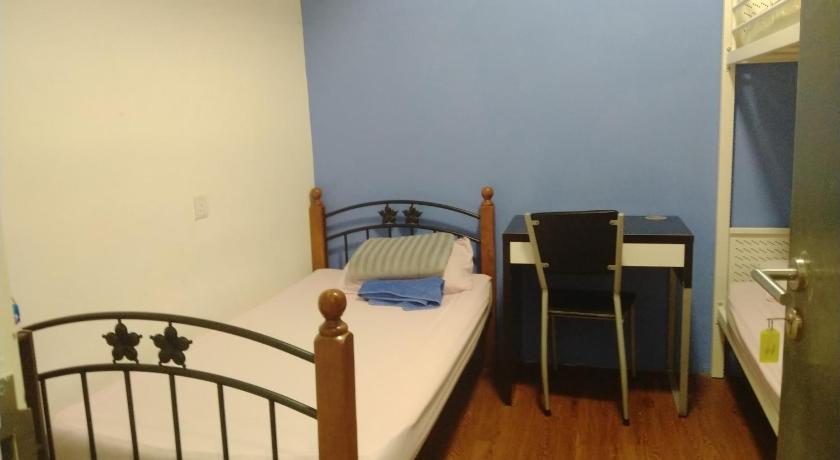 Image of Triple Room with Shared Bathroom 4