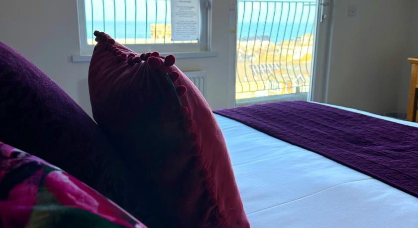 Image of Deluxe Sea View Two Bedroom Family Suite with Balcony 7