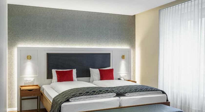 Фото: Двухместный номер Стандарт с 2 кроватями (Standard Twin Room) 9