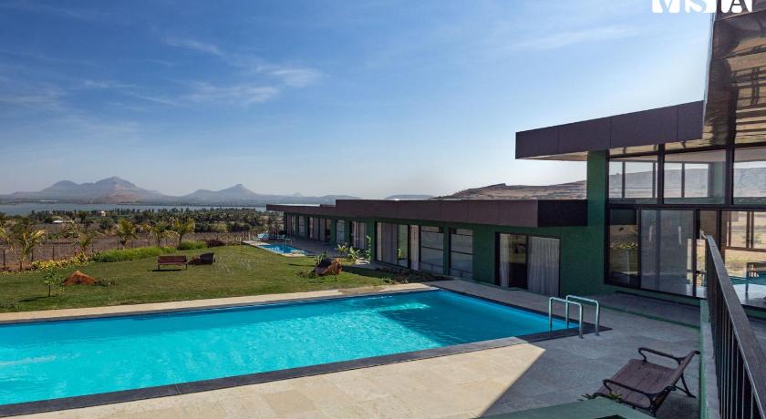 StayVista's Minty Mirage - Mountain & Lake-View Villa with Pool, Expansive Lawn & Terrace