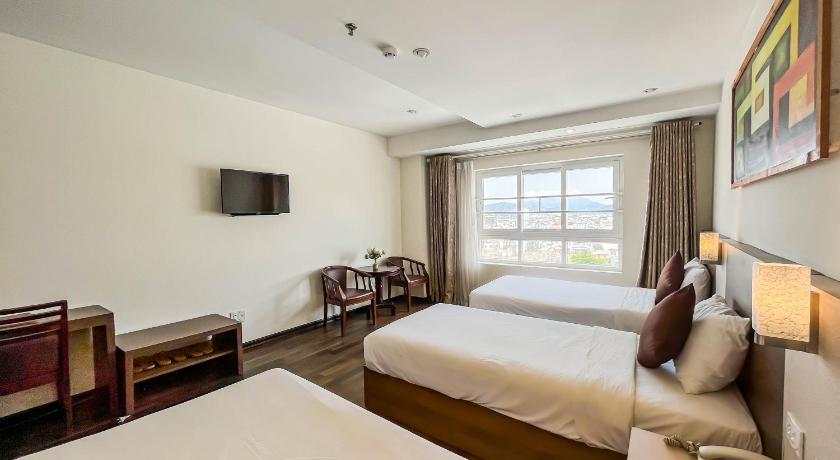 Image of Triple Room with City View 3