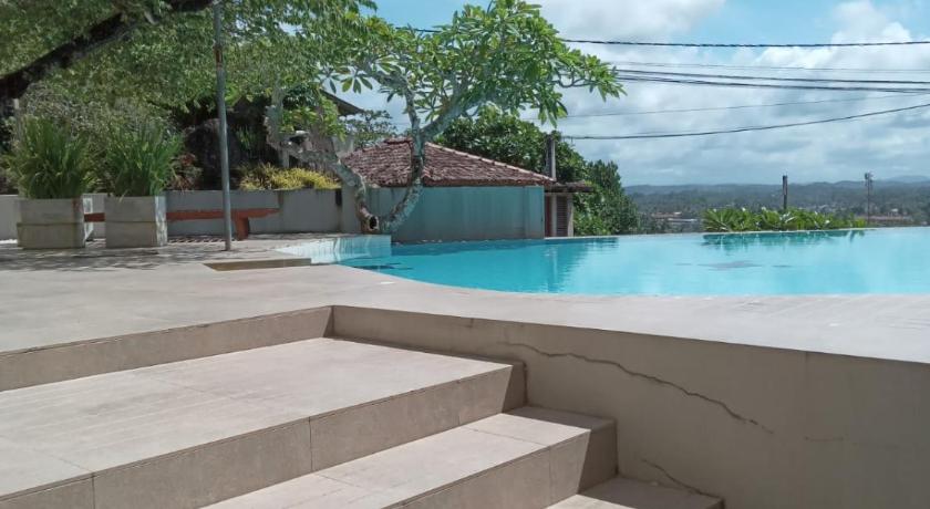 Image of Deluxe Double Room with Patio 13