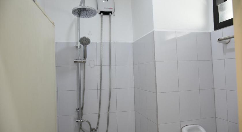 a bathroom with a shower stall and a toilet, Basaya Laemchabang in Chonburi