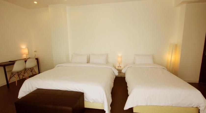 Image of Standard Triple (1 Double Bed And 1 Single Bed) 9