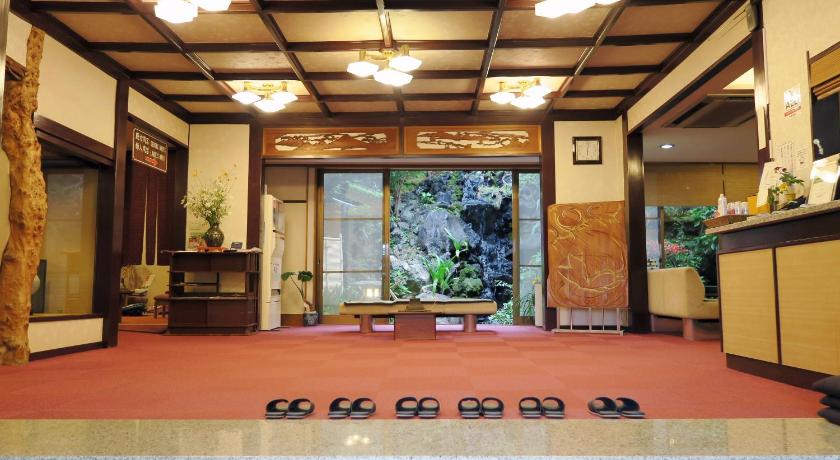 a large room with a large clock on the wall, Nippon Ryokan Ito Onsen Yokikan in Atami