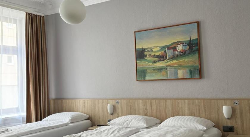 Image of Quadruple Room with Private Shower and Shared Toilet 0