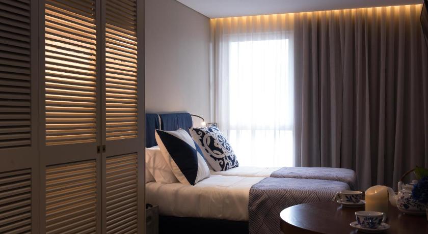 รูปของห้องเตียงใหญ่พร้อมลานระเบียง (Double Room with Terrace) 1