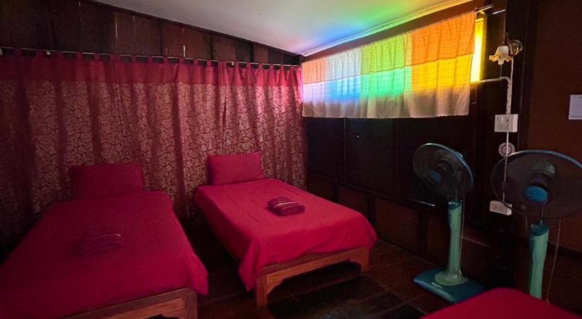 Image of Triple Room with Fan and Shared Bathroom 6