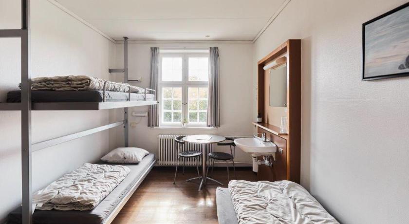 Image of Triple Room with Shared Bathroom 0