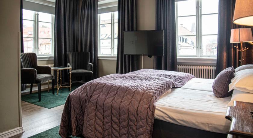 Bild av 2 Single Beds, Nonsmoking, Double Room, Premium, Sitting Area 7