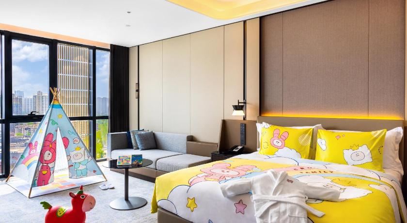 Image of Premium Room with One King and One Queen Bed - Kids Theme 0