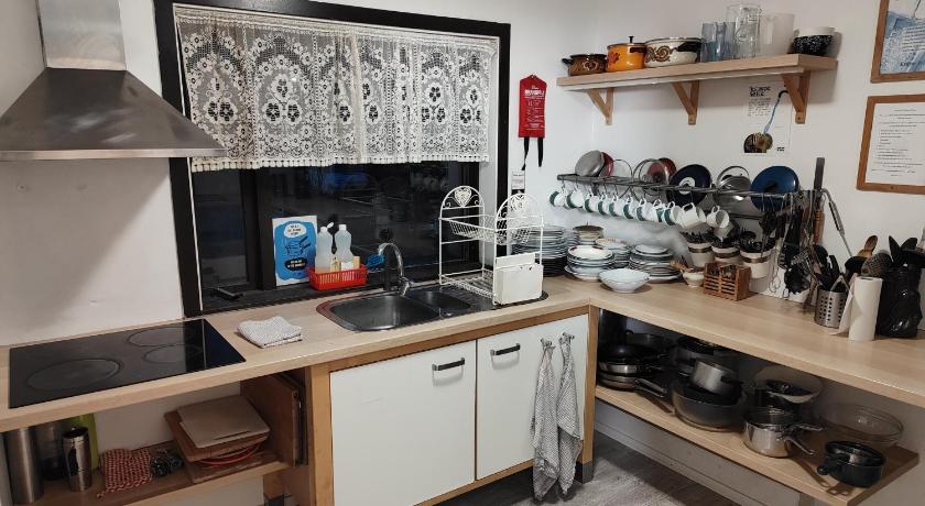 Image of Economy Quadruple Room with Shared Bathroom 4
