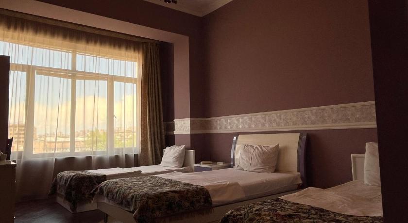 Image of Triple Room with City View 0