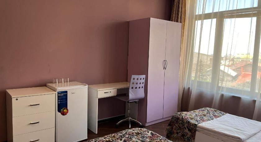 Image of Triple Room with City View 2