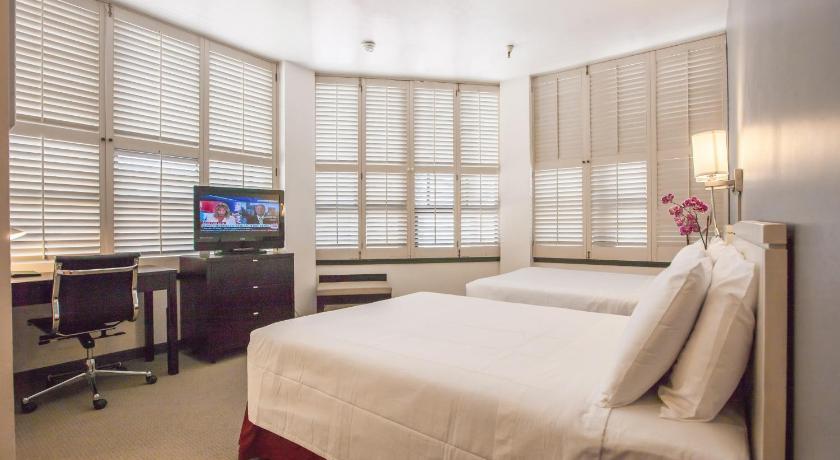 Imagen de Habitación Doble con 2 Camas Dobles (Double Room with Two Double Beds) 1
