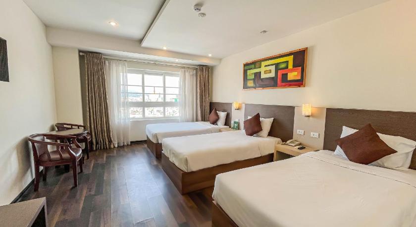 Image of Triple Room with City View 0