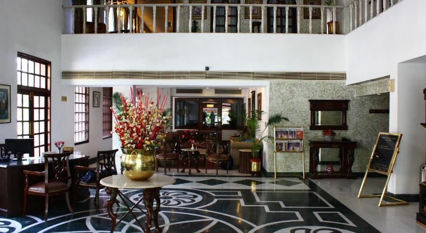 a living room filled with lots of furniture, Ashok Country Resort in New Delhi and NCR