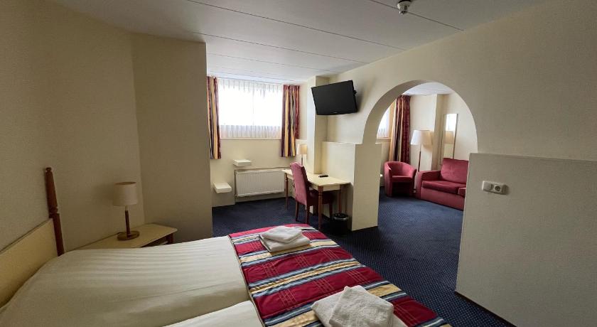 Image of Standaard kamer met douche en extra bed in het souterrain 0