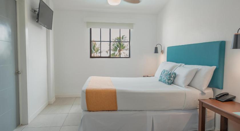 Imagem de Quarto com Cama Queen-size e Vista da Piscina (Queen Room with Pool View) 1