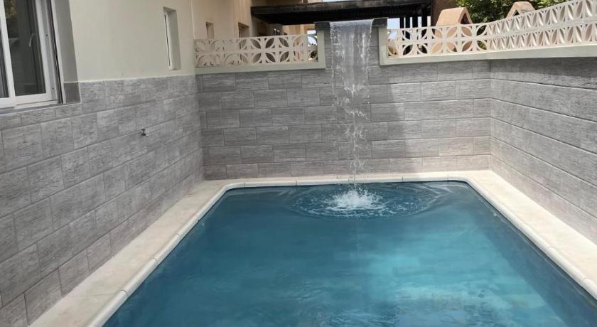 Foto Villa avec piscine privée et pergola - Booking Diskon Spesial