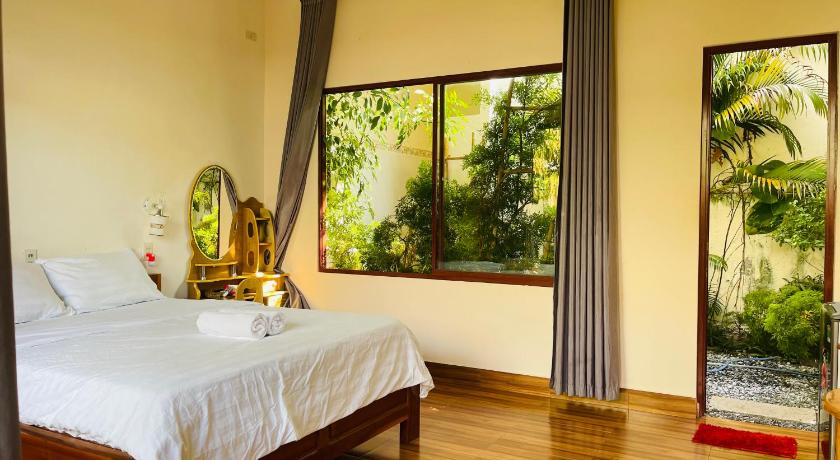 Image of Deluxe Room (2 Adults + 1 Child) 4