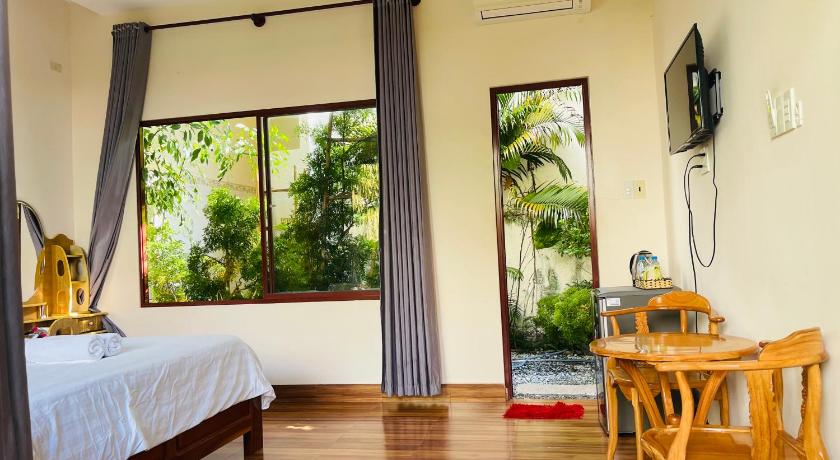 Image of Deluxe Room (2 Adults + 1 Child) 8