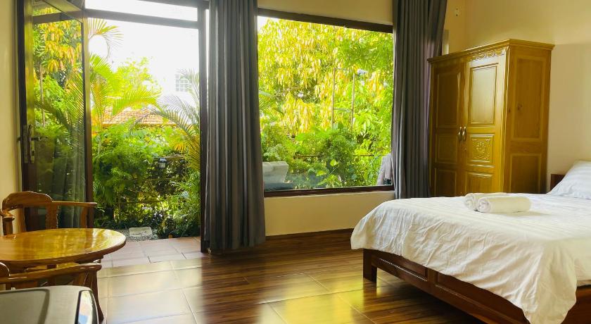 Image of Deluxe Room (2 Adults + 1 Child) 0
