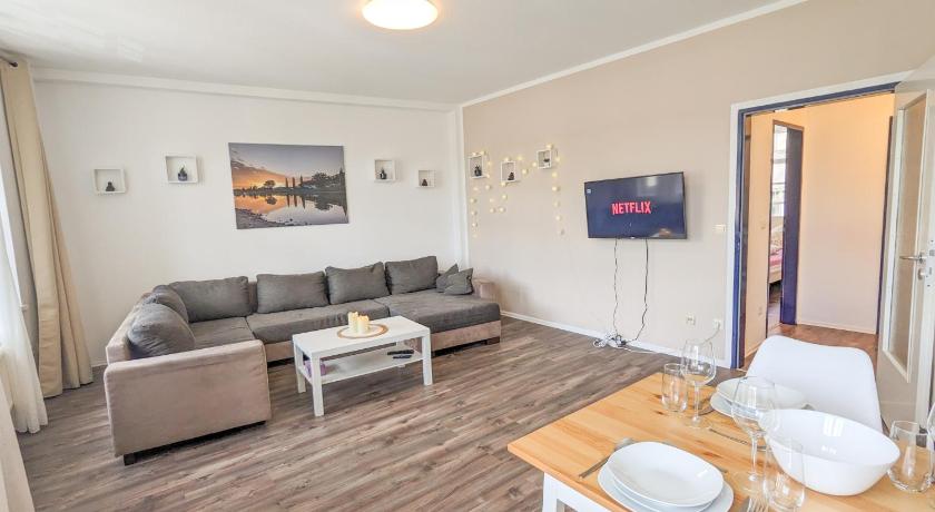 Urlaubsmagie - Ferienwohnung Heidelbeere - Gemeinschaftsgarten, Sauna & Saisonaler Pool