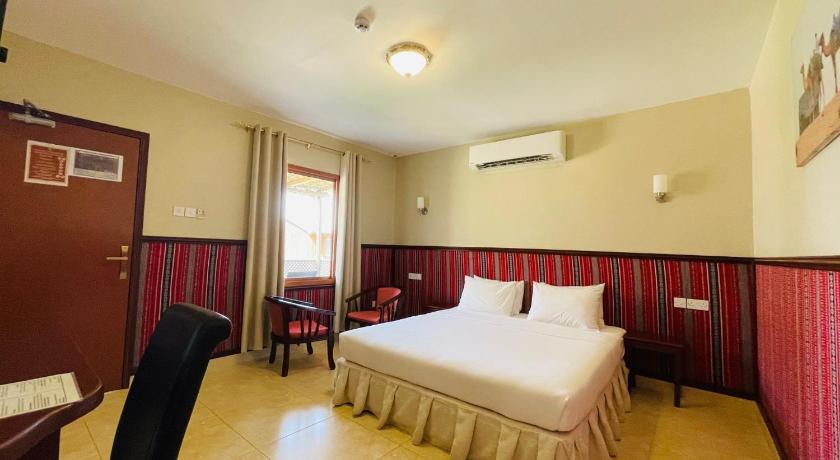 Image of Deluxe - Air Conditioning 11