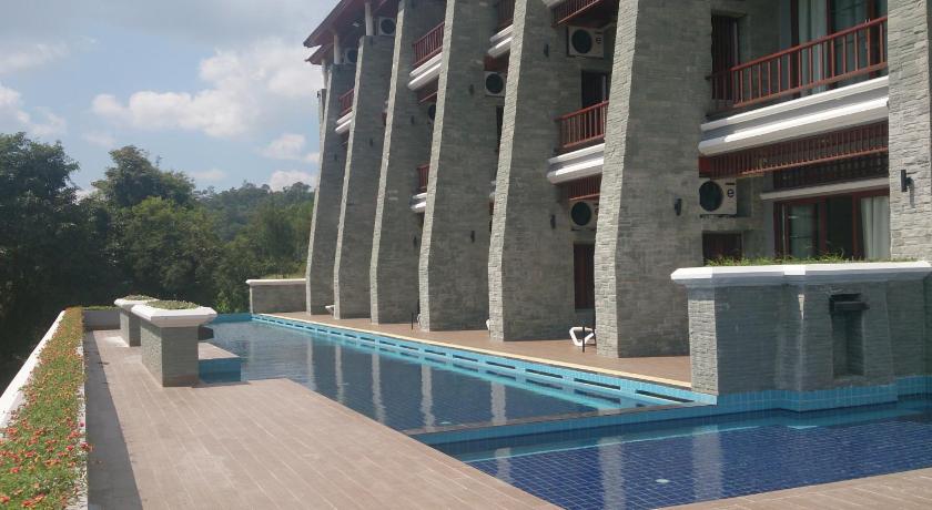a large swimming pool in front of a large building, Phurua Sanctuary Resort & Spa in Loei