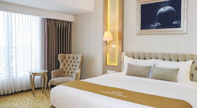 Foto Kamar Deluxe Queen (Deluxe Queen Room) 8