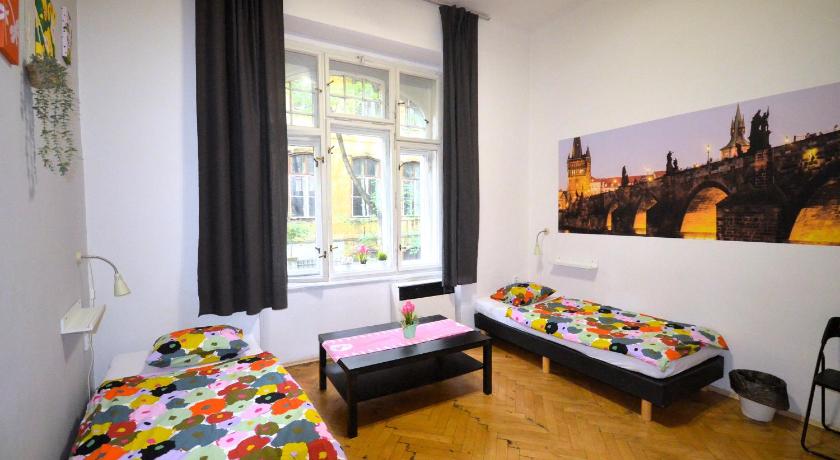 Image of Economy Quadruple Room with Shared Bathroom 0