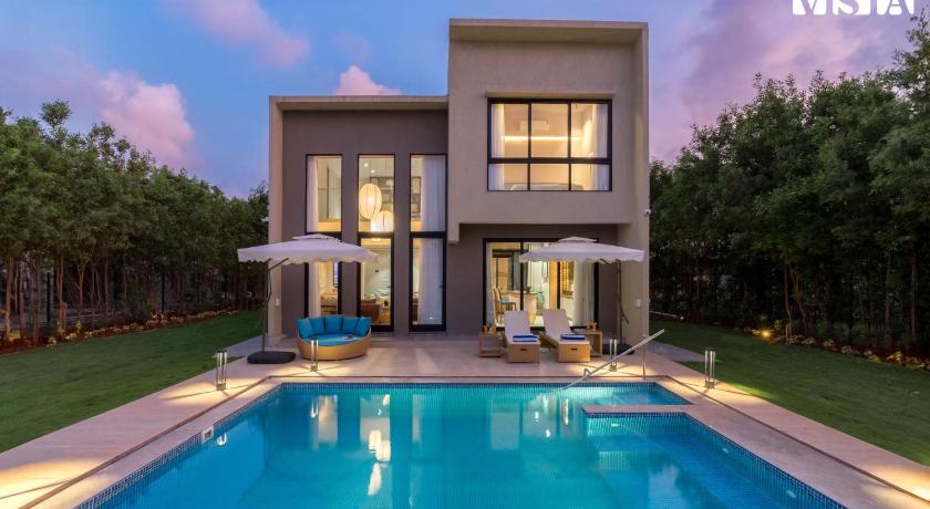 Sunlit Splendour by StayVista near Nagaon beach boasting an Outdoor pool and Modern chic interiors