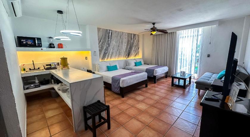 Image of Suite-2 Double Beds, Non-Smoking, Sofabed, Flat Screen Television, Kitchenette, Refrigerator 1