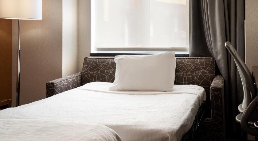 Image of 1 QUEEN BED WITH SOFABED 1
